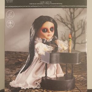 Creepy Doll with Piano and Candle